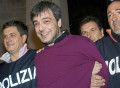 Italian police arrest Camorra mafia boss Antonio Iovine in 2010, after 14 years on the run